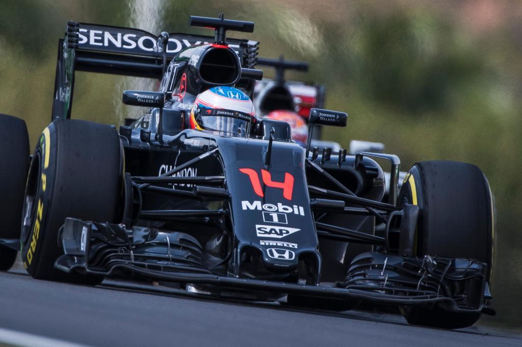 McLaren Honda&apos;s Spanish driver Fernando Alonso drives during the...