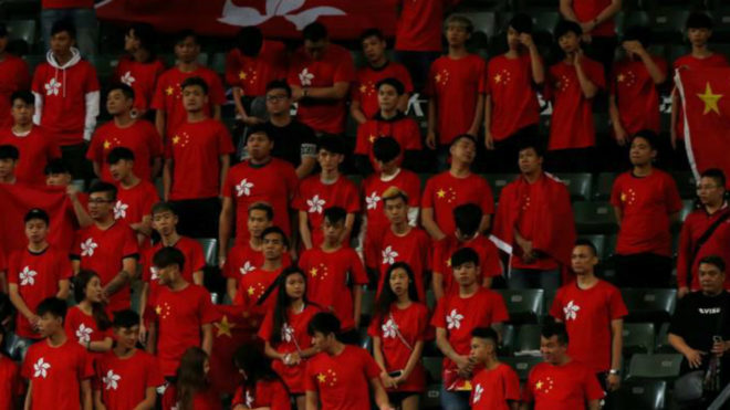 Hong Kong football fans defy Beijing by booing Chinese national anthem