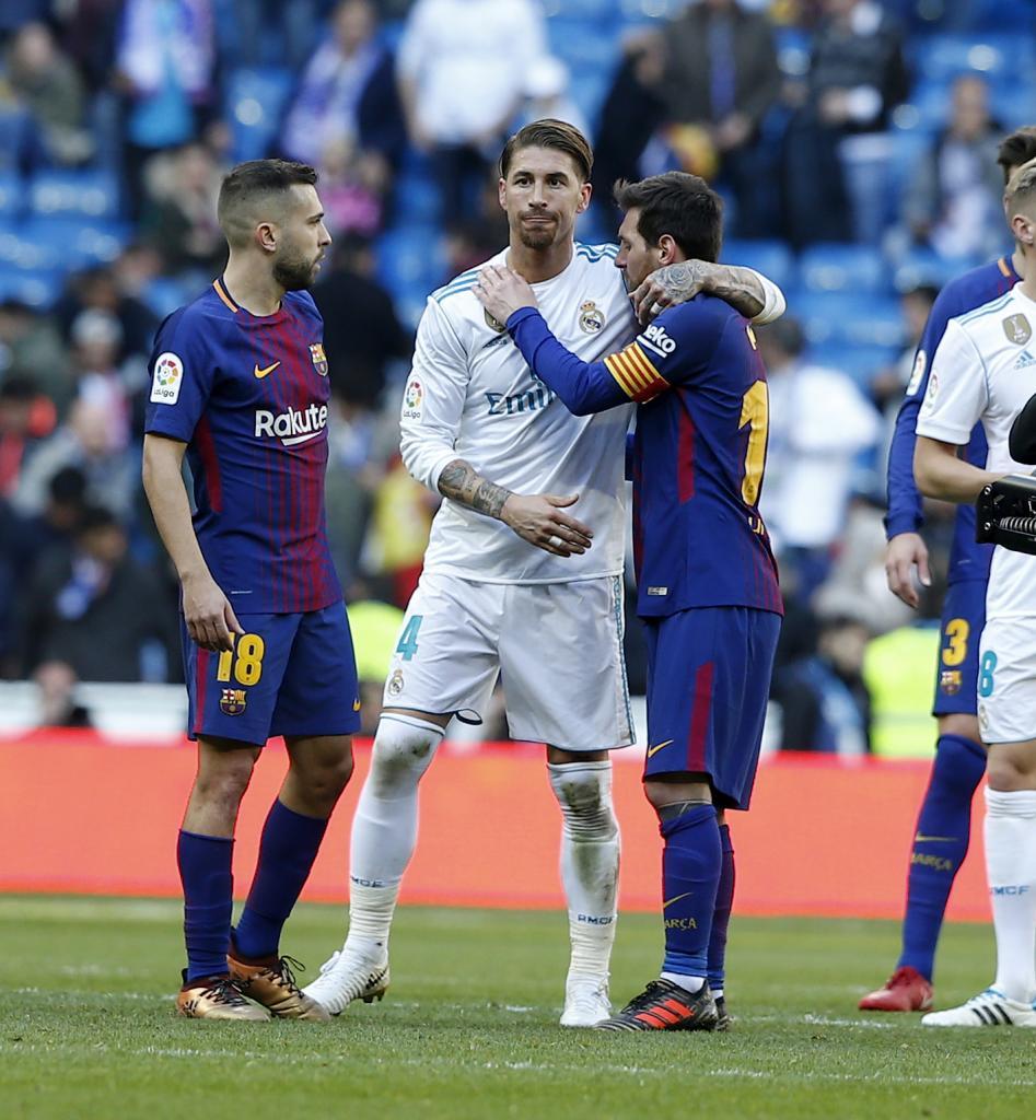 Ramos embraces Messi at full-time