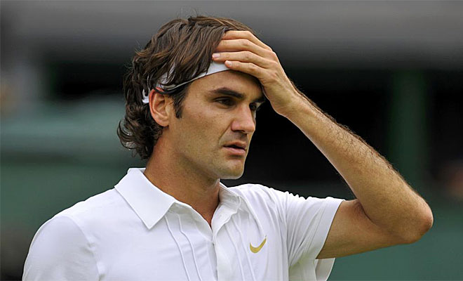 Federer sufri� de lo lindo para pasar la primera ronda de Wimbledon. El suizo, defensor del t�tulo, tuvo que remontar un 0-2 para ganar al colombiano Alejandro Falla.