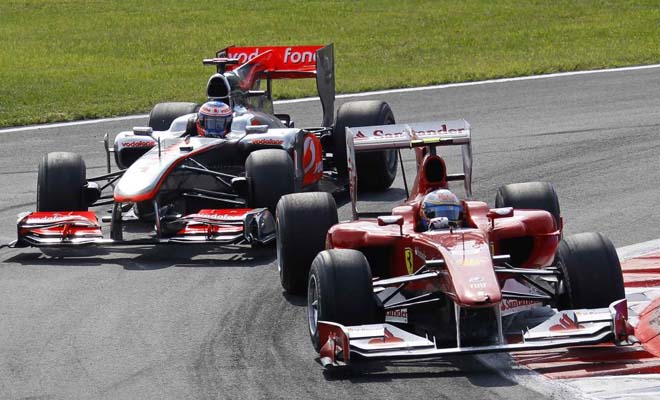 Button y Alonso protagonizaron un duelo espectacular que se resolvi en favor del espaol en los boxes.