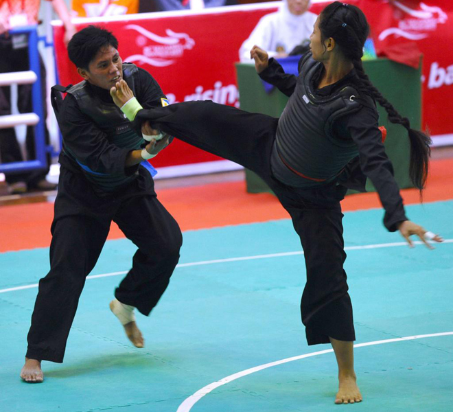 Ha tenido lugar durante los SEAGAMES celebrado en Jakarta, enfrent Hnin Thida de Myanmar, contra el filipino Nerlin Huinda, en un combate de Pencak.