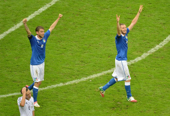 Claudio Marchisio and Federico Balzaretti celebrate after winning the Euro 2012 football championships semi-final match Germany vs Italy.