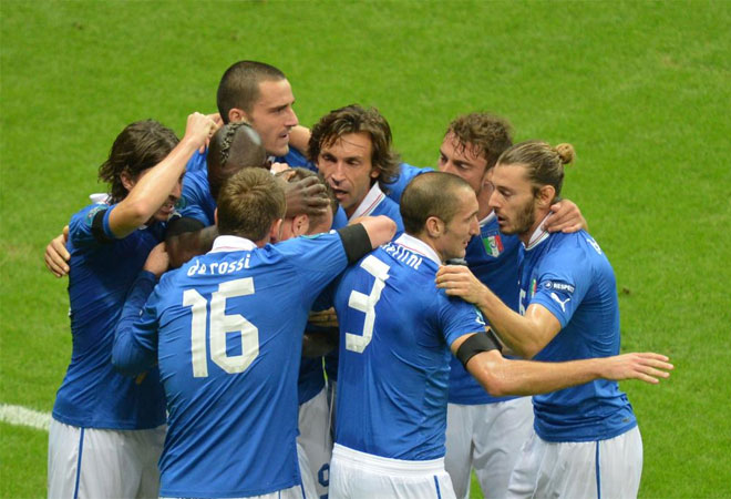 Italian players celebrate after winning the Euro 2012 football championships semi-final match.