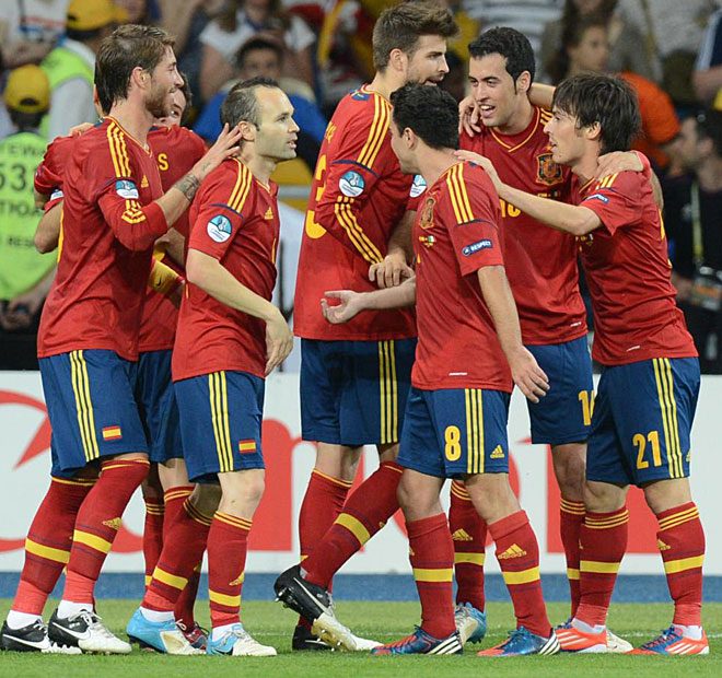 Spanish players celebrate after scoring a second goal during the Euro 2012 football championships final match Spain vs Italy on July 1, 2012 at the Olympic Stadium in Kiev.