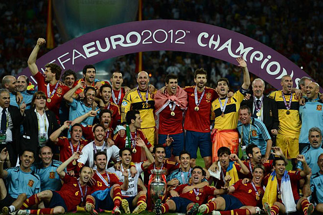 Spanish players celebrate after winning the Euro 2012 football championships final match Spain vs Italy on July 1, 2012 at the Olympic Stadium in Kiev .