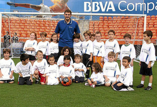 Iker Casillas participates in a private soccer for 100 plus kids as BBVA Compass and Real Madrid Foundation Launch Sports And Achievement Academy at BBVA Compass Stadium on July 13, 2012 in Houston, Texas.