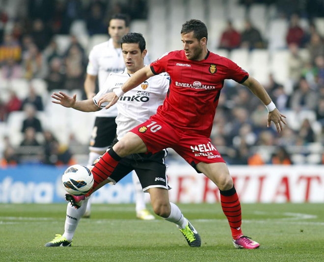 El Valencia se impuso (2-0) al Mallorca en un partido que jug durante una hora con un hombre menos.