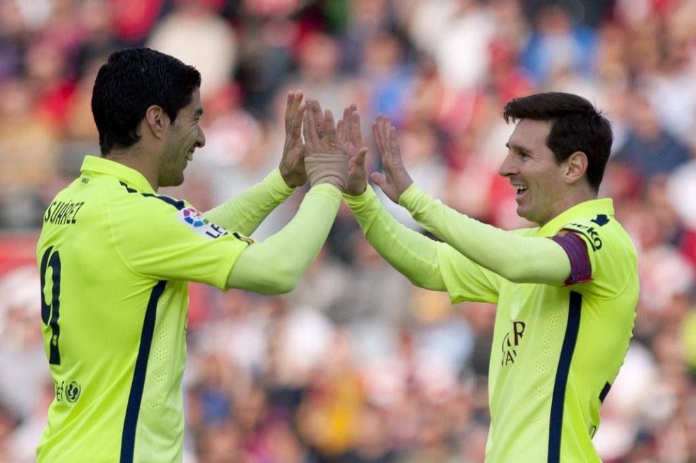 Messi celebra su gol con Luis Suarez