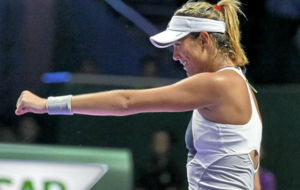 Garbie celebra un punto durante el Masters femenino de Singapur