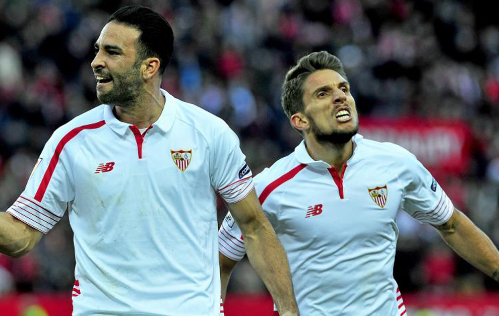 Rami y Carrio celebran un gol del Sevilla
