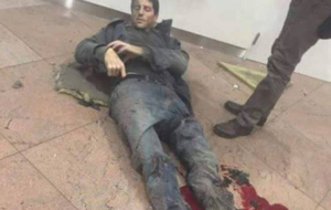 Sebastian Bellin herido en el suelo tras los atentados terroristas de...