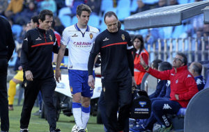 Campins se retira lesionado en el partido frente al Girona.