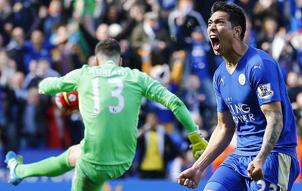 Leonardo Ulloa celebrates scoring the second goal for Leicester from...