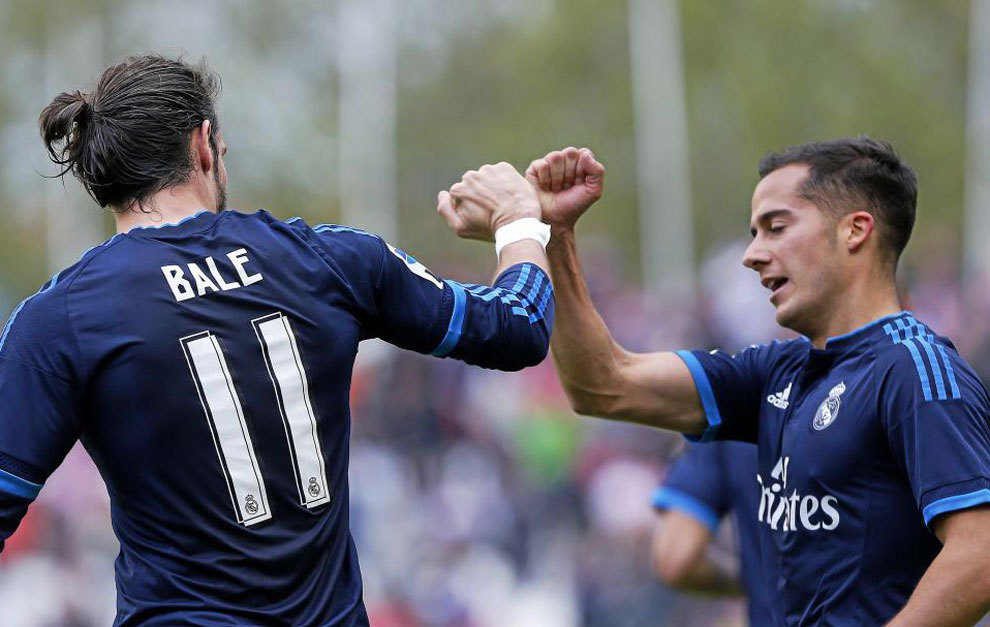 Bale y Lucas celebran uno de los goles al Rayo Vallecano.