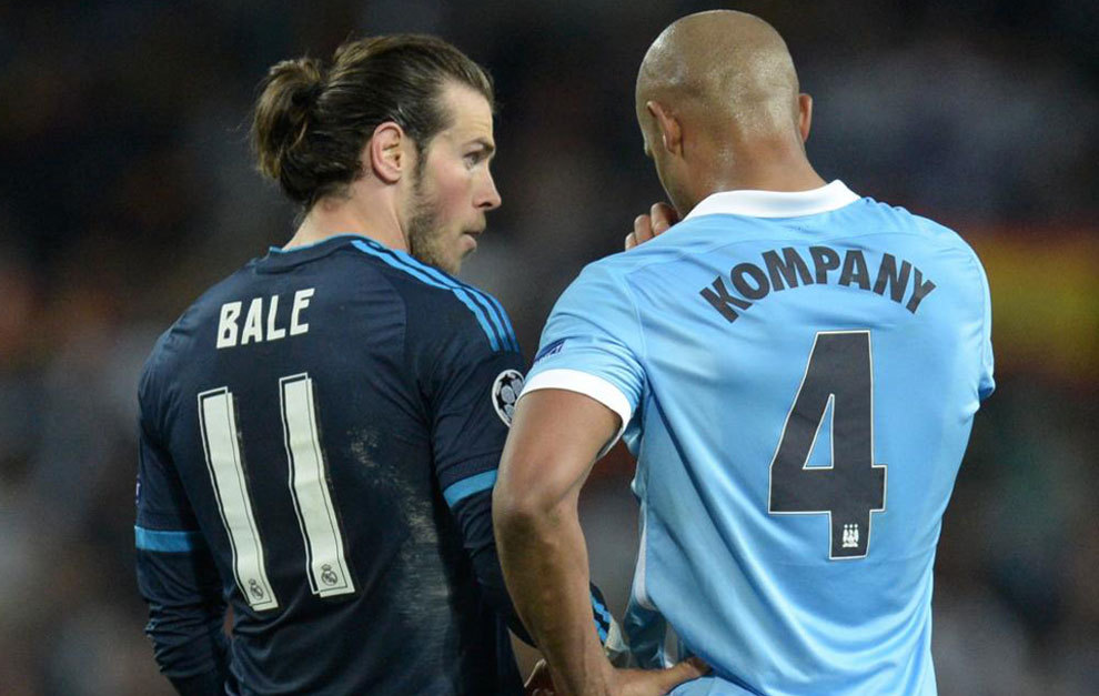 Gareth Bale y Vincent Kompany durante la ida de la semifinal de la...