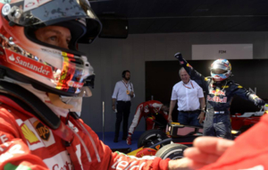 Vettel llega a la zona del podio, con Verstappen celebrando detrs