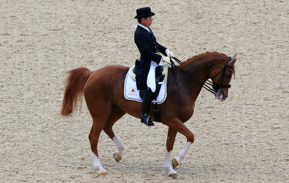 Hiroshi Hoketsu durante una competicin con su caballo.