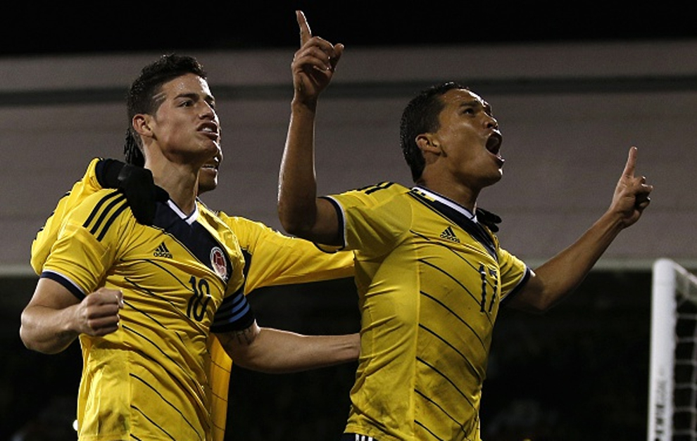 James y Bacca, celebrando un gol con Colombia.