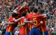 TOPSHOT - Spain&apos;s players celebrate after Spain&apos;s defender Gerard...