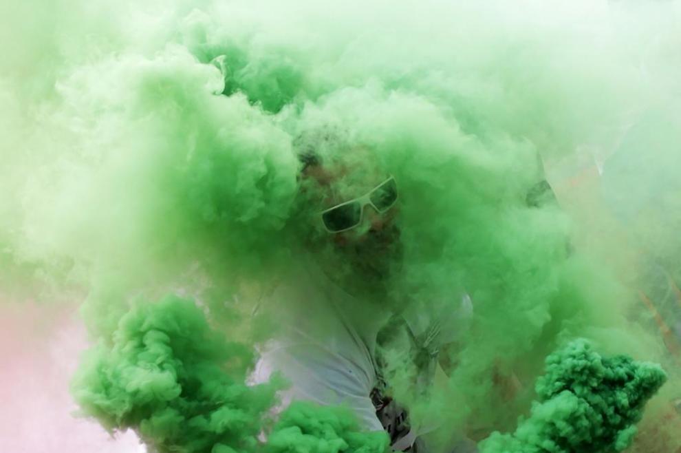 A Hungarian ultra gets covered in flare smoke