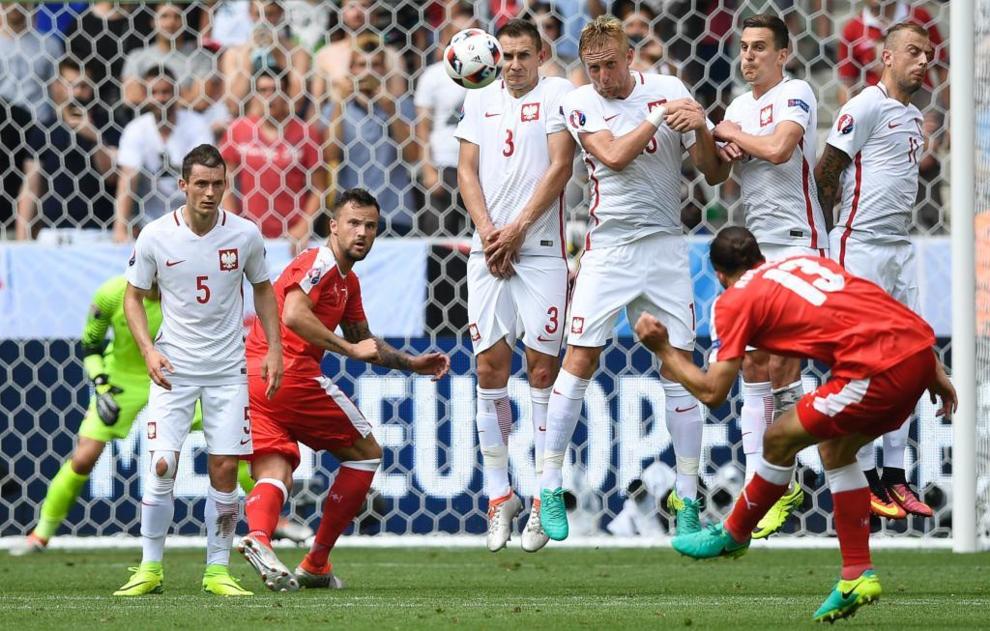 Ricardo Rodrguez launches a free-kick at goal against Poland