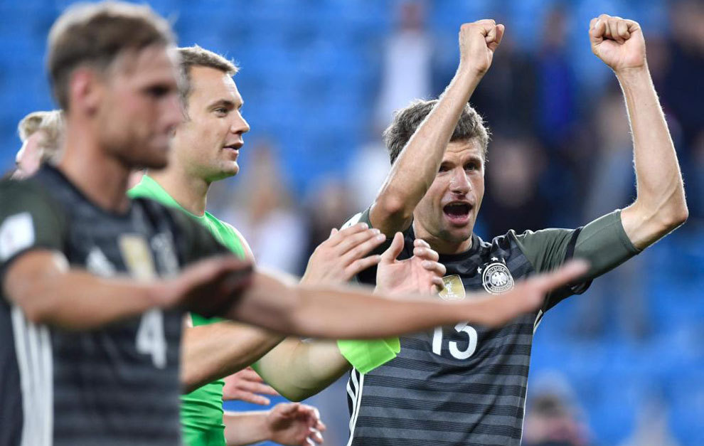 Thomas Mueller celebrates after the match between Norway and Germany