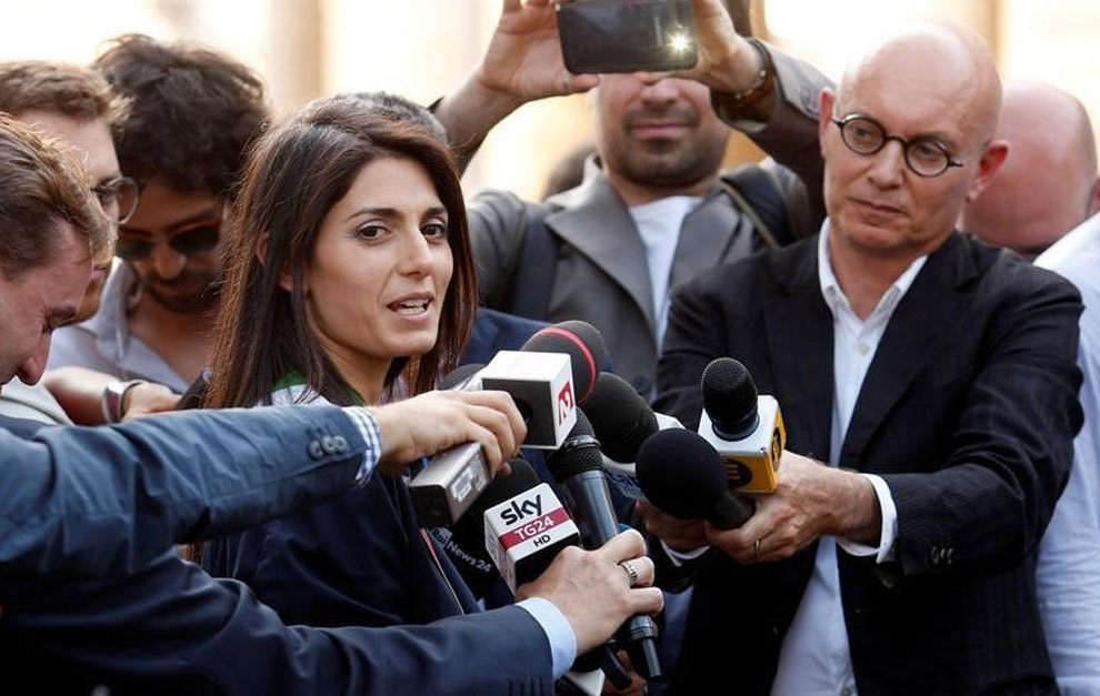 Rome&apos;s newly elected mayor Virginia Raggi, speaks with journalists.