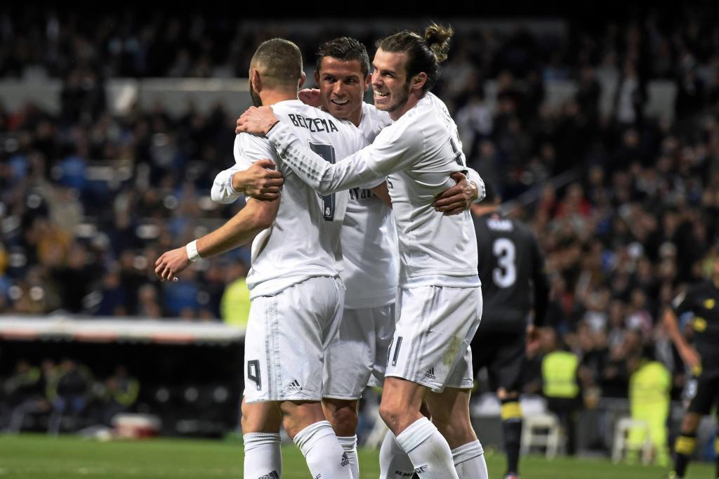 Benzema, Bale y Cristiano celebran un tanto.