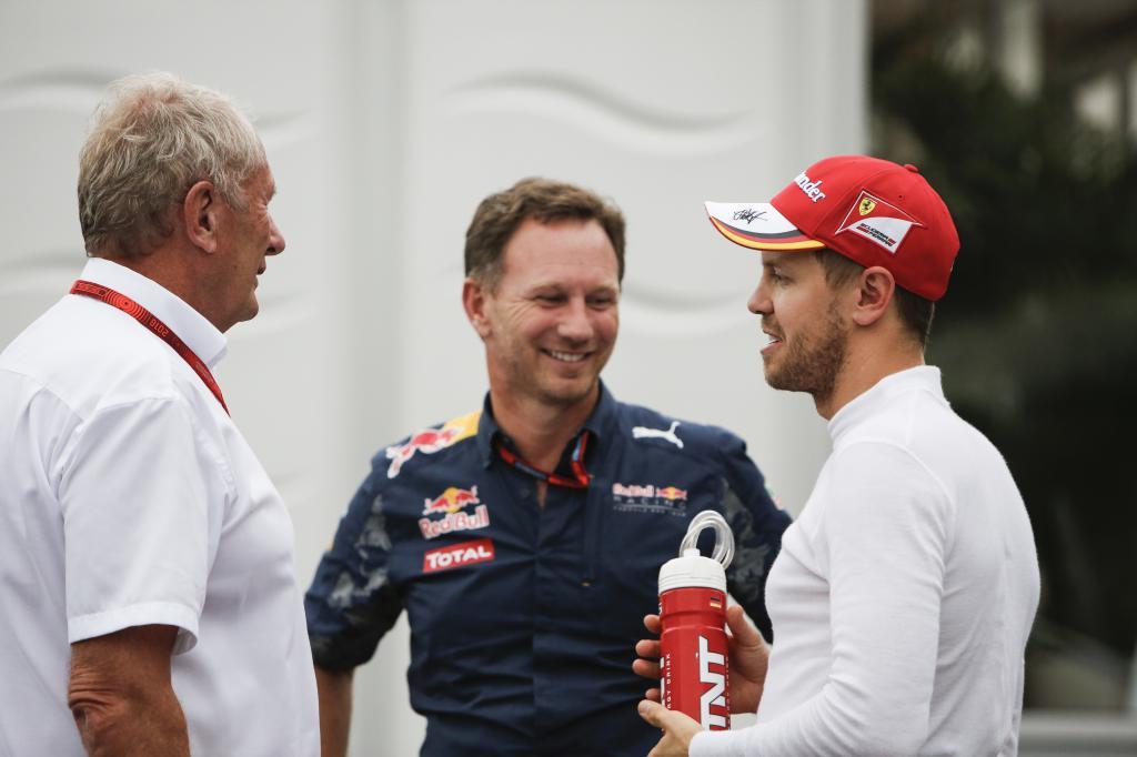 Dietrich Mateschitz, Christian Horner y Sebastian Vettel, en Suzuka.