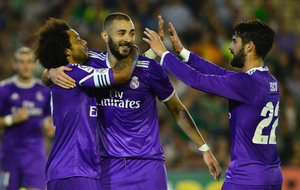 Marcelo, Benzema and Isco celebrating a goal against Betis.