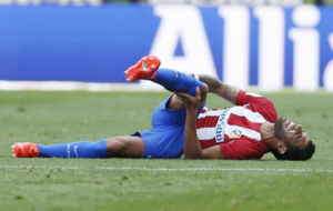 Augusto lesionado en el partido contra el Deportivo