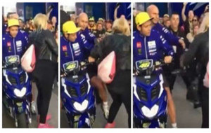 Momento en el que Rossi toca con su pie a la aficionada para apartarla...