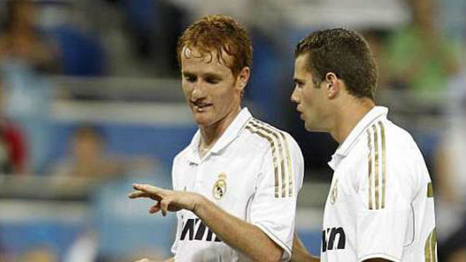 lex y Nacho, en un partido con el Real Madrid.