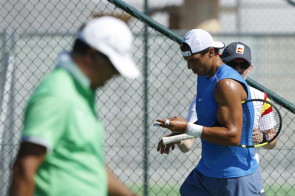 Rafa y Toni Nadal durante un entrenamiento en Ro de Janeiro.