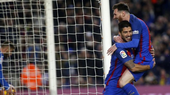 Messi y Luis Surez celebran un gol