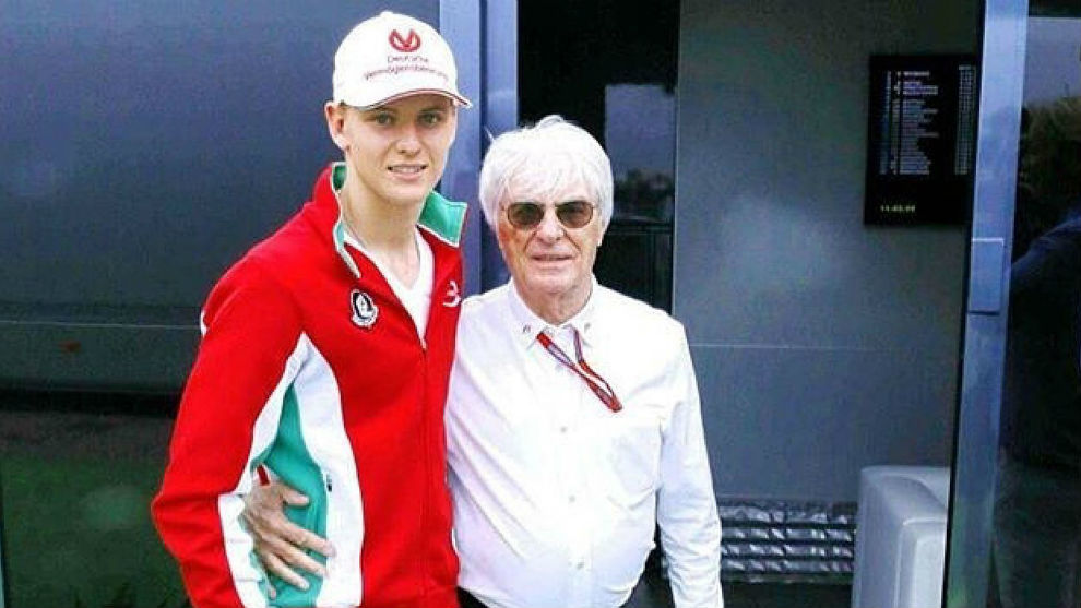 Mick Schumahcer, junto a Ecclestone, en el GP de Alemania