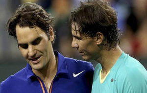 Federer y Nadal tras disputar un partido juntos.