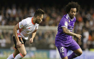 Marcelo y Munir en el partido entre Madrid y Valencia