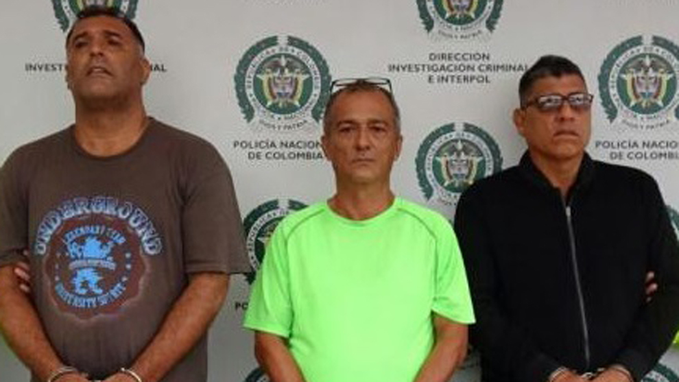 John Jario Jimnez, a la izquierda, tras ser detenido.