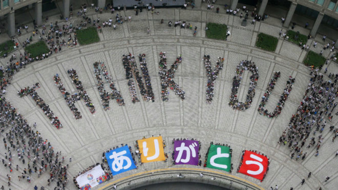 Aficionados celebran la designacin de Tokio como sede de los Juegos...