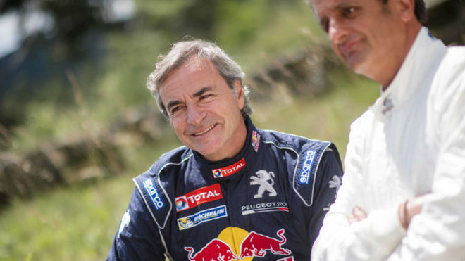 Carlos Sainz, con su ex copiloto Luis Moya.