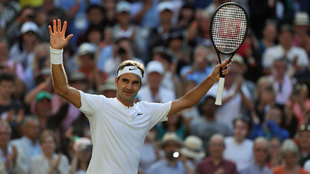 Federer celebrando su victoria ante Raonic