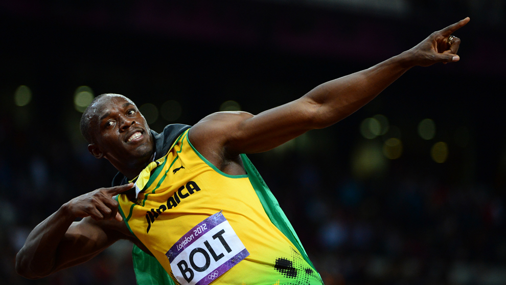 Usain Bolt celebra tras imponerse en la carrera de los 100 metros en...