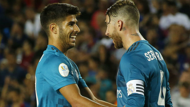Asensio y Ramos, celebrando el triunfo en el Camp Nou.