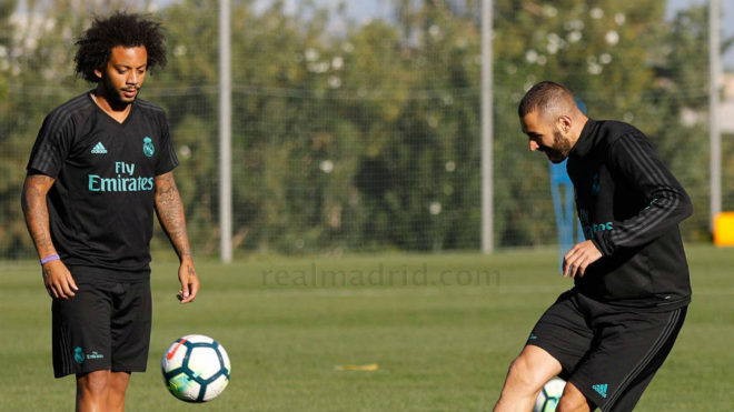 Marcelo y Benzema, en Valdebebas.