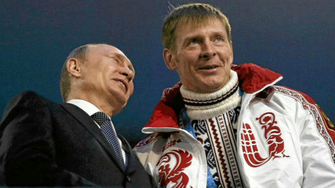 Alexander Zubkov con Putin en la ceremonia de clausura de Sochi 2014.