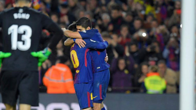 Messi y Surez festejan un gol al Girona.