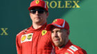 Kimi Raikkonen, junto a su compaero Sebastian Vettel