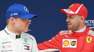 Sebastian Vettel, junto con Valtteri Bottas